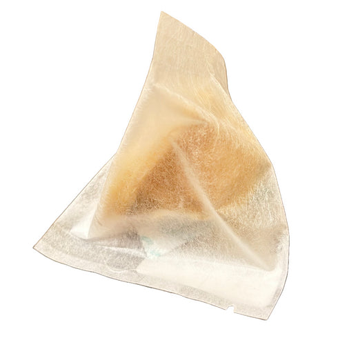 生姜のドライフルーツ。ドライジンジャーピールをテトラポット型の個包装にしてある趣旨を説明する画像。龍雲の袋を使用。