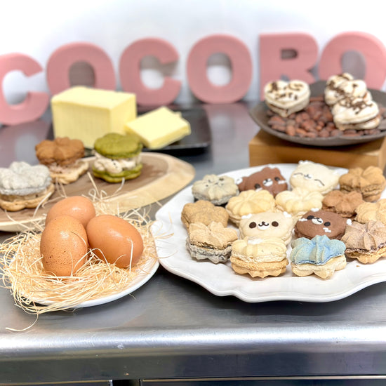 様々なマカロンを集合させて撮影。マカロンの原材料、バターや卵も一緒に。