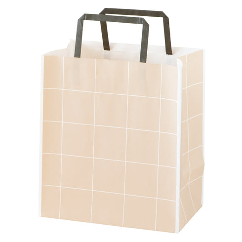 紙袋の写真。紙バンドの持ち手。